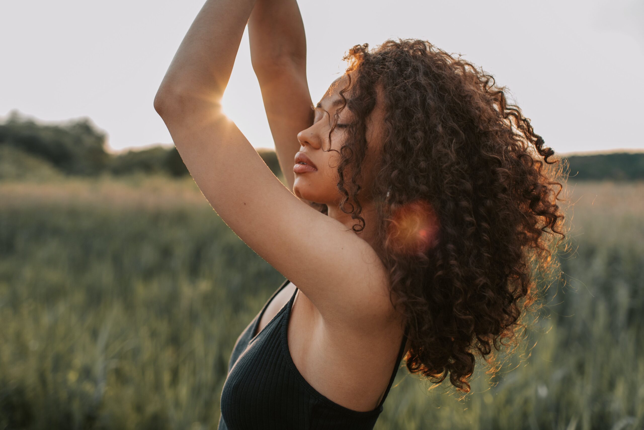 A woman standing in the sun